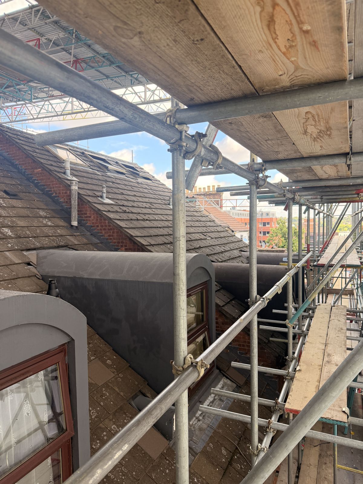 Roofscape across the block before works
