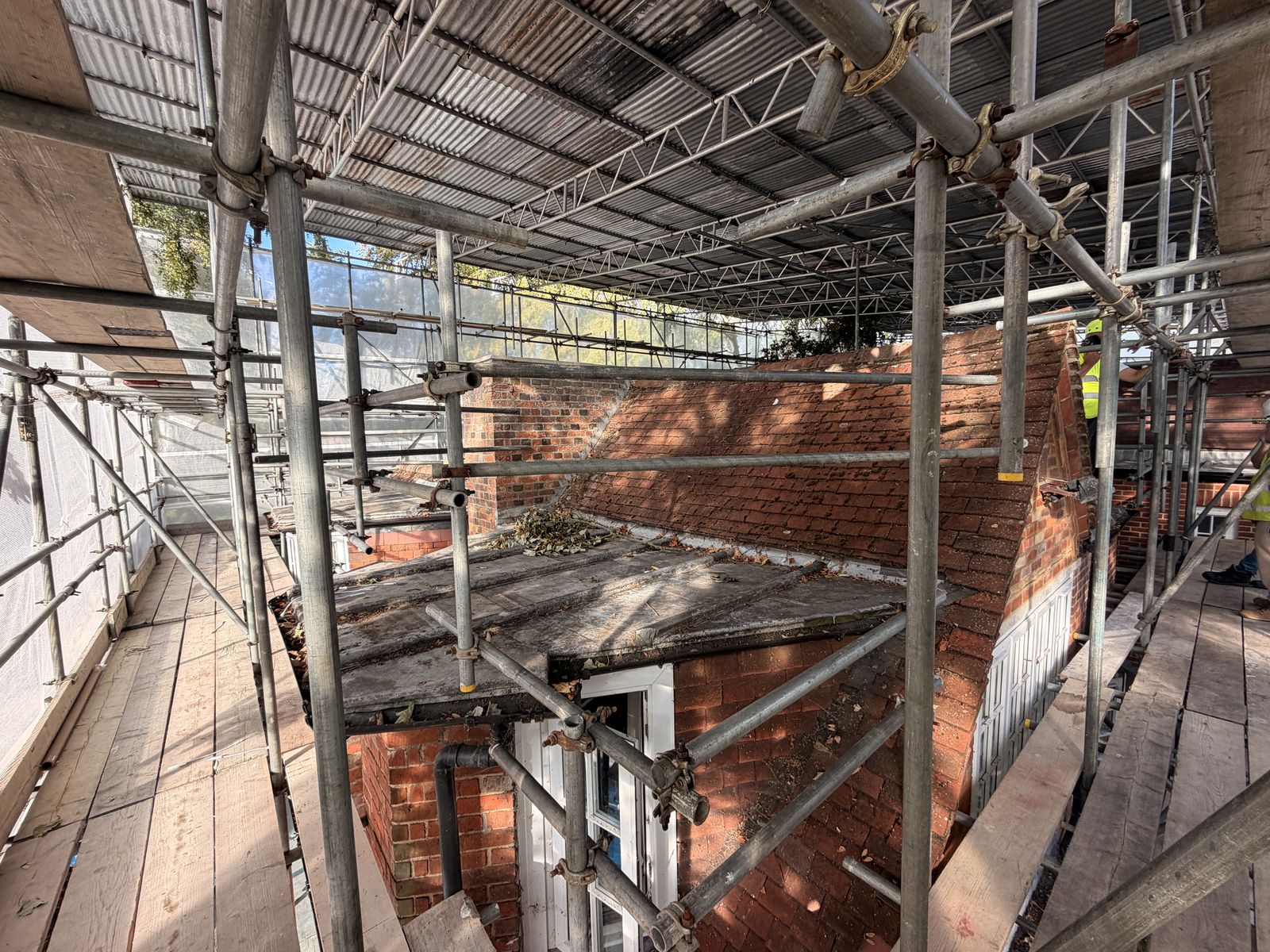 Existing roofscape recorded before works, beneath the temporary roof