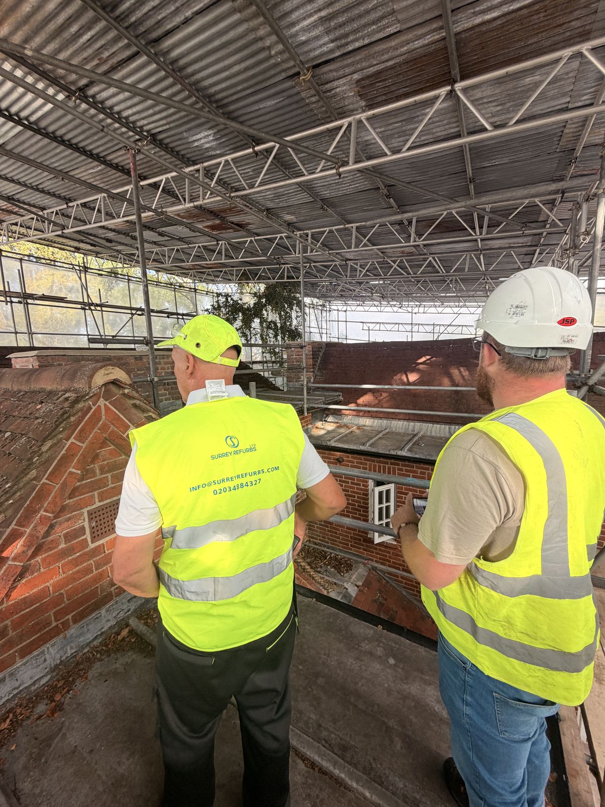 Surrey Refurbs operatives carrying out the pre-start roof survey