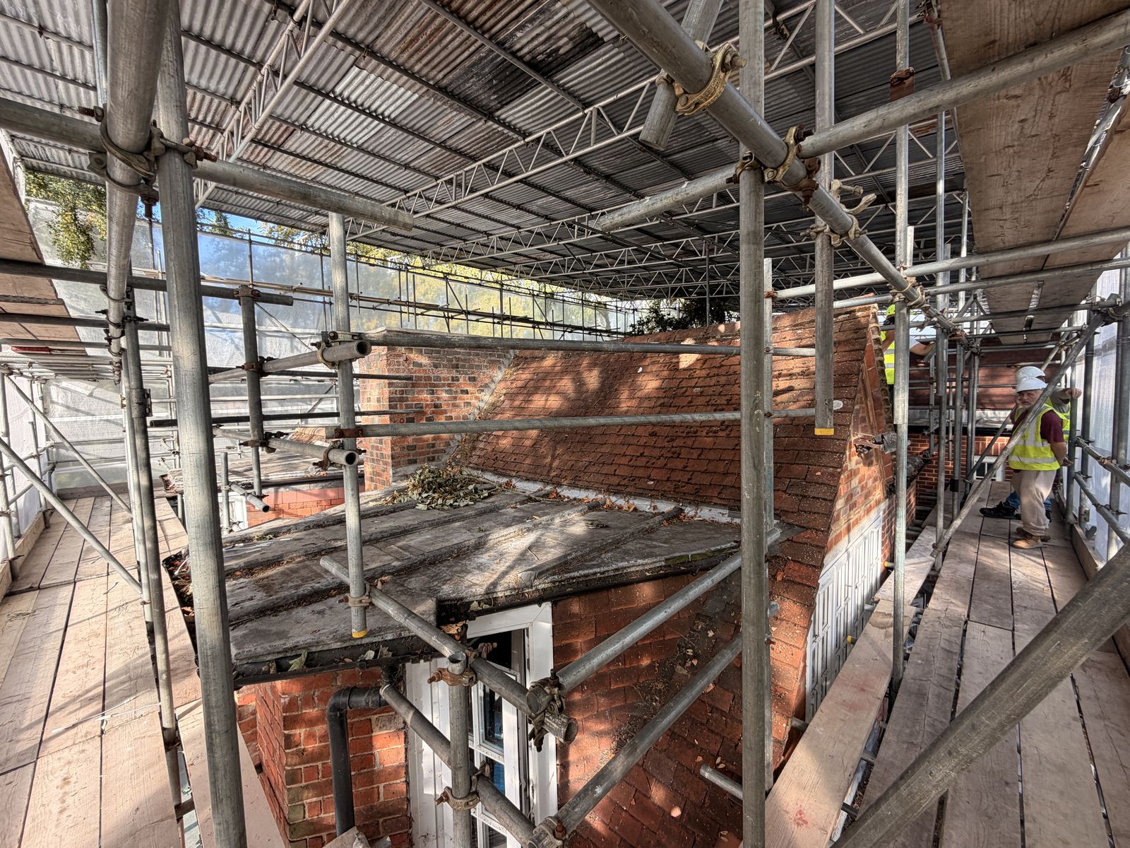 Roof survey underway beneath the temporary roof