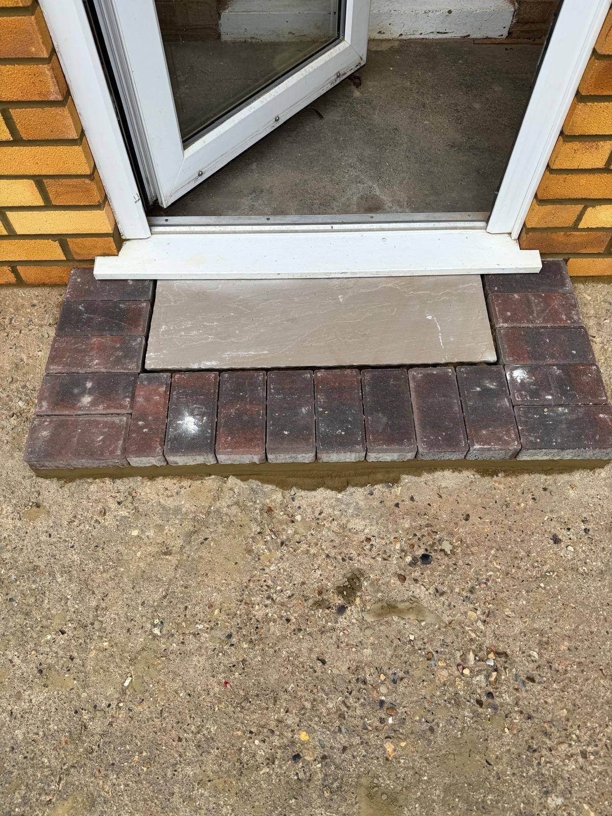 New paved threshold and stone step