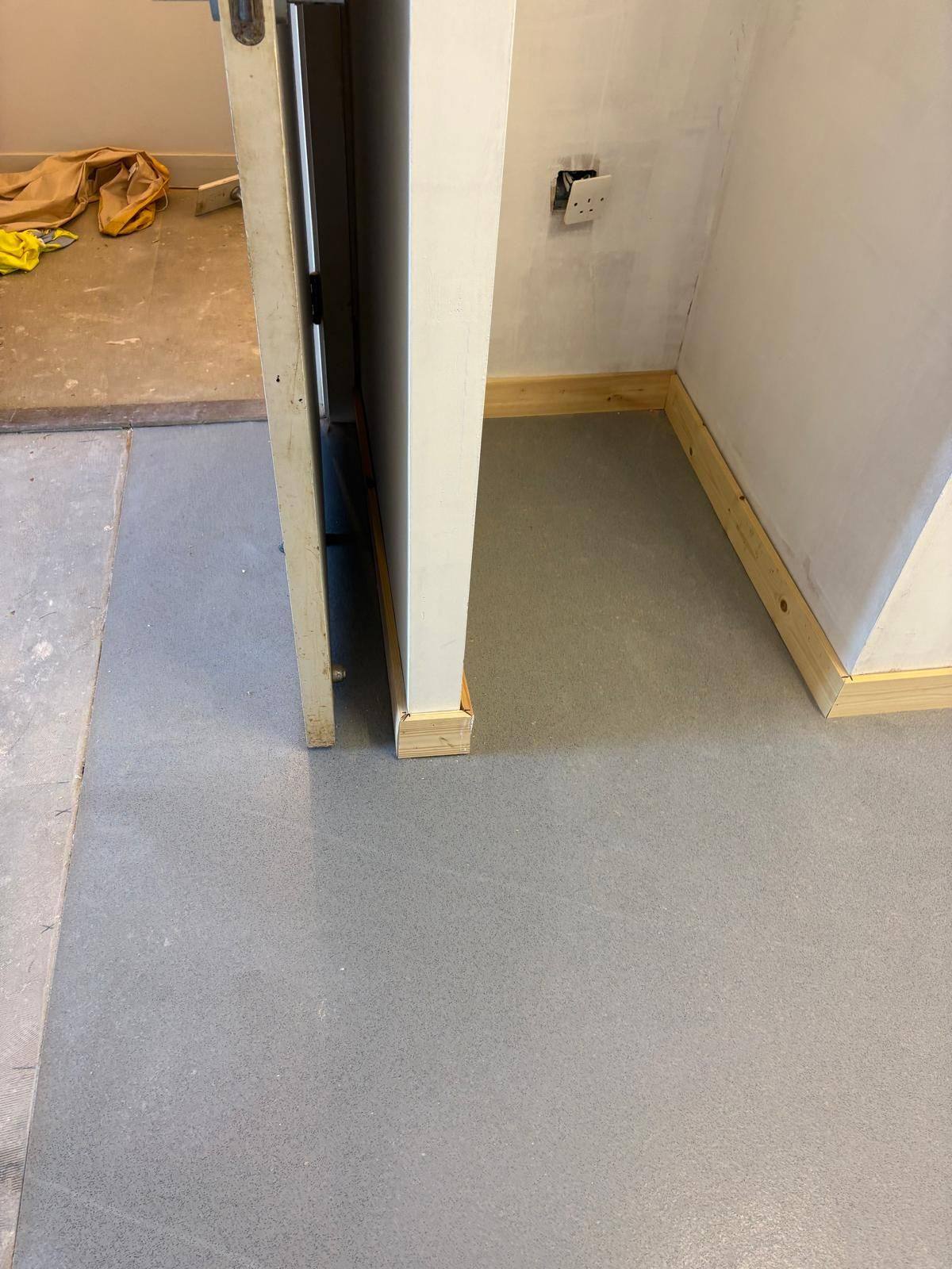 New floor coverings and skirtings, decorated and complete
